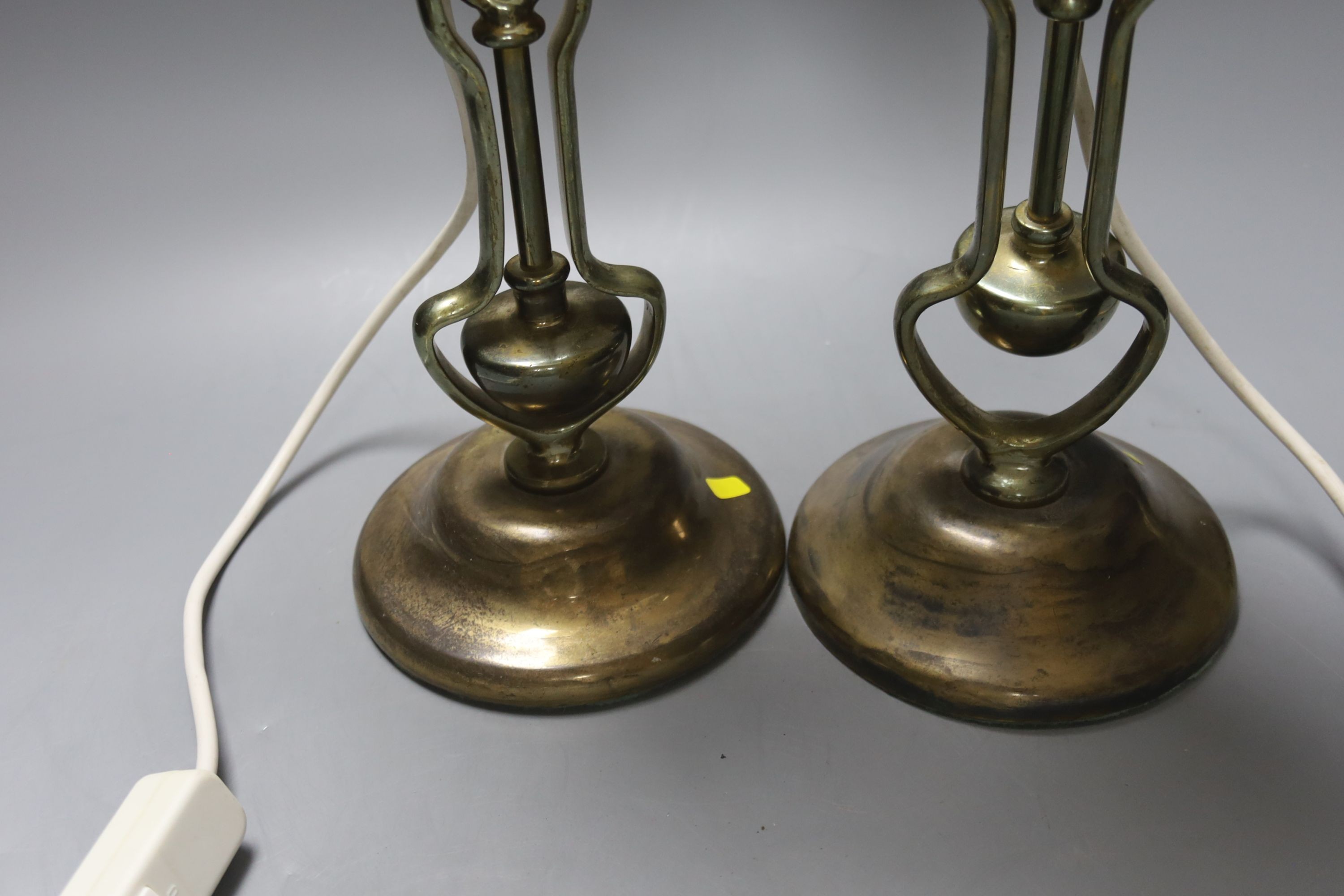 A pair of brass gimbaled ship's lamps